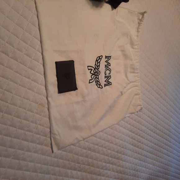 AUTHENTIC MCM SMALL SILVER/BLACK BACKPACK